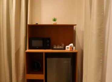 Balcony room twin bed minibar